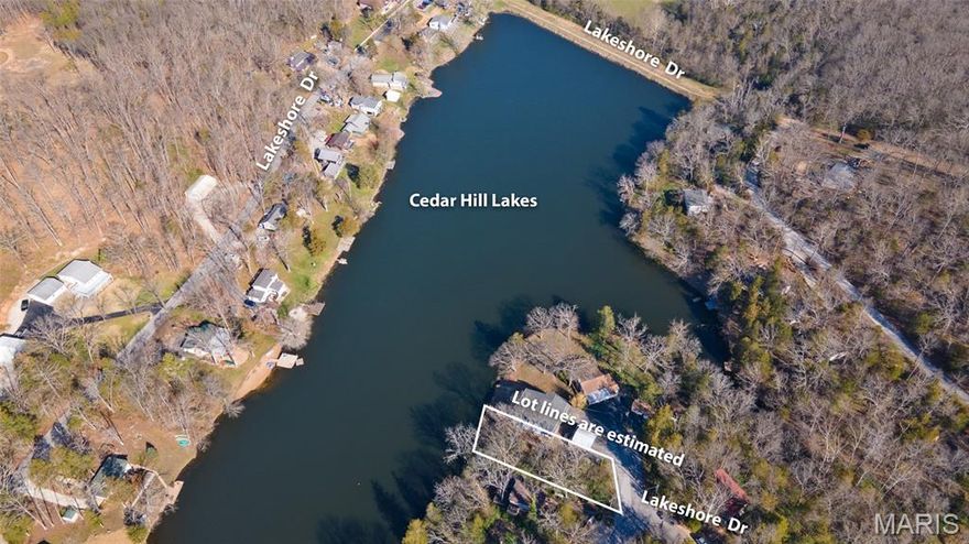 A prime lakefront lot awaits its new owner!