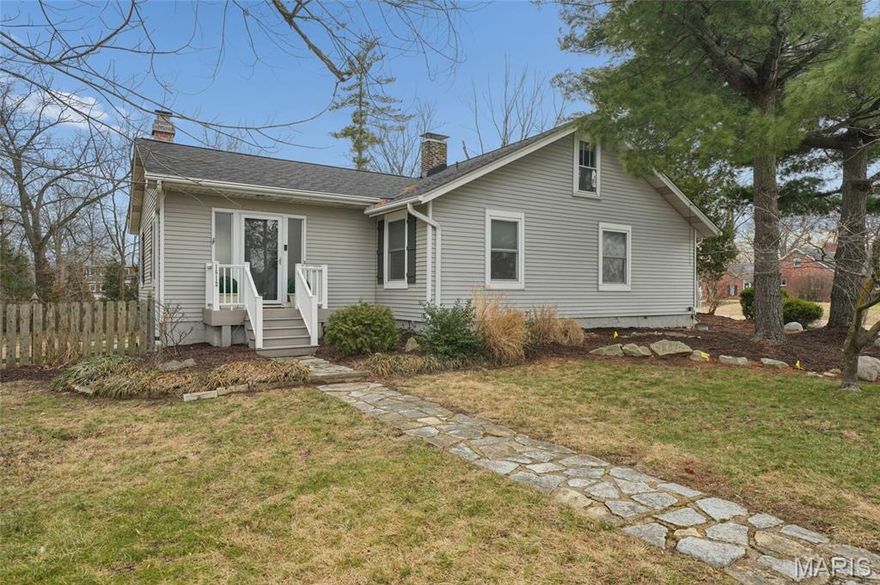 Renovated cottage charm in Kirkwood, sublime! All the character & cozy charm you expect in Kirkwood renovated with style & panache. The open floor plan was thoughtfully designed for the way we live today. The kitchen features modern cabinetry, quartz counters with waterfall edge, a massive center island & breakfast bar, SS appl. including gas range & range hood, French door refrigerator. Kitchen is open to dining area & sunroom. Primary suite has a large, professionally organized closet & luxury bath with double sink vanity & step-in rain shower with designer tile. There are beautiful wood floors throughout & gas, ventless fireplace. Walls of windows across back of house overlook large private backyard, patio & firepit all backing to trees. The walk-out LL is finished with rec room & office area with full bath. Roof 2024, furnace/AC 2022, still under transferrable warranty, water heater 2019. Enjoy everything Kirkwood has to offer, top-rated schools, fabulous town center with restaurants, shops & farmers market, Kirkwood Community Center, pool & park!