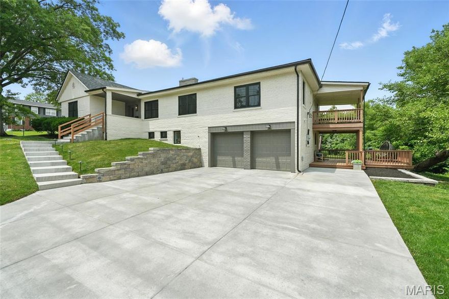 This completely renovated home combines luxury & functionality with about 4000 sq. ft. of
beautifully designed, open concept layout for modern living.
The open split bedroom floor plan connects the kitchen, living/dining/family rooms, all 3
beds making it perfect for multi-generational living. The heart of this home is the gourmet
kitchen, featuring central island with quartz waterfall countertop, top of the line stainless
steel appliances, striking ties backsplash, plenty of storage space & walkout to the new
deck. Main floor laundry offers the function you need.
The private owner master suite boasts floor & walls covered with Italian tiles, free standing
bathtub, shower & double bowled vanity with a marble countertop. On the opposite side of the
home, 2 beds offer privacy & share a full bath with double bowled vanity.
Gorgeous oak hardwood flooring floors seamlessly throughout the home adding warmth &
sophistication to every room.
Head down to finished livable area offering 2 additional beds with egress windows, office, full
bath, wet bar with dual zone wine cooler, recreational room and another laundry, ceramic
tile flooring and walk out to extended deck which is a peaceful escape to start or end your
day.
Other features include the new roof, windows, doors, lighting, zoned HVAC.
This is more than just a home- it’s a lifestyle.
Walking distance to Kirkwood downtown.