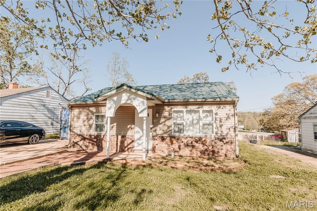 Photo of 106 N Newport Lane, Waynesville, MO 65583 (MLS # 26022942)