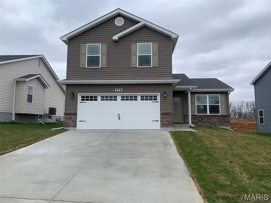 BRAND NEW home with every option you could imagine! They include vaulted ceilings, rounded “bullnose” corners, granite or quartz countertops, stainless steel appliances, 42" cabinets with "cushion close", custom neutral-colored paint job throughout, LVT flooring throughout most of the home, framed windows, taller baseboards, adult-sized cabinets in bathrooms with marble countertops, walk-in closets, upgraded carriage garage doors with openers on 2  CAR Garage, full bath rough-in, panel doors (many varieties), and upgraded water/light fixtures throughout the house! Second FLOOR laundry! Fully sodded yard (front/sides/back). *Pictures are of previously built homes. Builder/Broker* This home is USDA eligible.