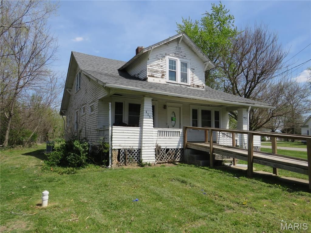 Photo of 415 E Water Street, Wellsville, MO 63384 (MLS # 26020721)