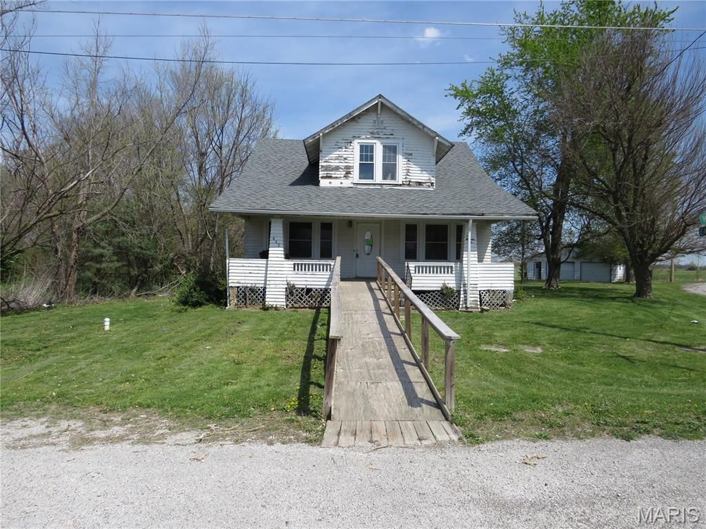 Photo of 415 E Water Street, Wellsville, MO 63384 (MLS # 26020721)