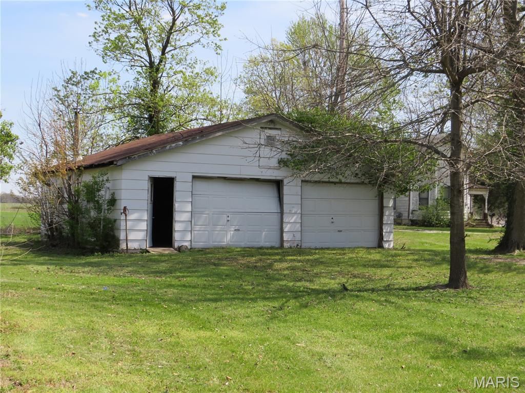 Photo of 415 E Water Street, Wellsville, MO 63384 (MLS # 26020721)