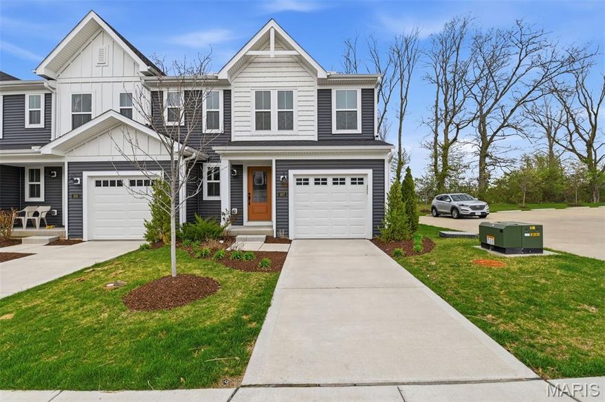 This stunning end-unit townhome offers 3 spacious bedrooms and 4 bathrooms, blending modern design with everyday comfort. The open-concept main level features a kitchen with a island that flows seamlessly into the living room, perfect for entertaining or family gatherings. A finished basement with a full bathroom provides flexible space for a media room, gym, or guest suite. Step outside to your private patio backing to trees. Additional parking is conveniently located right next to the unit, making daily life easier. Situated just minutes from Hwy 64, this home offers quick access to shopping, dining, and commuting routes. With its prime location, thoughtful layout, and inviting outdoor space, this townhome is the ideal combination of style, functionality, and convenience.