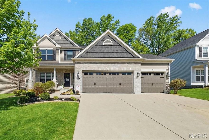 Professional photography coming 3/27.

Welcome to this former display home by Fischer & Frichtel, thoughtfully elevated with high-end upgrades throughout. From the moment you step inside, you’re greeted by a stunning flex space—currently used as a home office—featuring custom built-in cabinetry, quartz countertops, and an impressive 8-foot double bypass barn door system.
The entry flows seamlessly into the inviting family room, complete with a striking accent wall, cozy fireplace, and recessed lighting. The open-concept layout continues into the dining area and beautifully appointed kitchen, showcasing a center island with cultured marble countertops, 42-inch cabinetry with crown molding, glass tile backsplash, and stainless steel appliances.
The main level also includes a walk-in pantry, laundry room, and convenient half bath. Step outside through the impressive 8-foot sliding door onto the composite deck—perfect for entertaining or relaxing. Automated zebra blinds throughout the main floor provide the ideal balance of natural light and privacy.
Upstairs, you’ll find a spacious bonus room, three generously sized bedrooms, and two full baths. The hall bath features stylish shiplap wainscoting. The primary suite is truly a showstopper, boasting an elegant millwork accent wall paired with a custom tree mural. The luxurious primary bath offers a soaking tub, separate shower, relaxing private water closet, and a large walk-in closet.
The finished lower level expands your living space with a rec area, additional family room, full bedroom, and full bathroom—ideal for guests or multi-generational living.
Enjoy peaceful evenings on the charming front porch or take in breathtaking sunset views from the back deck. The fully fenced backyard is an entertainer’s dream, featuring a stamped concrete patio, a nearly new hot tub with built-in speakers and lighting, with added privacy elements from a Sunsetter awning for shade and comfort. The home has a partial tree view just beyond the large common ground area to the rear.
This home has been meticulously upgraded and truly stands out—offering the perfect blend of style, function, and luxury.