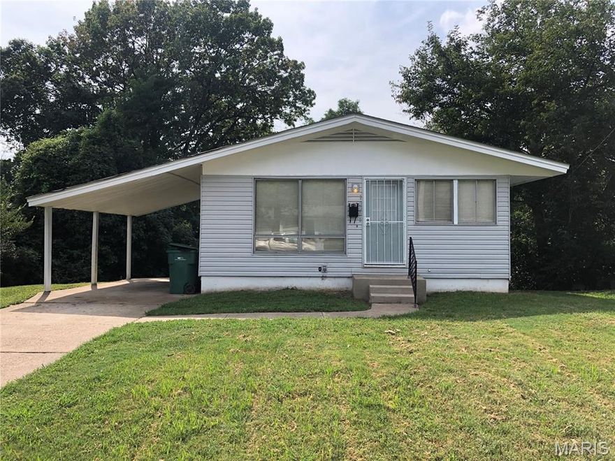 Welcome to 10201 Gourock Drive, a beautifully updated 3-bedroom, 1-bath home located on a quiet street in Saint Louis County. This home features lovely refinished hardwood floors throughout, creating a warm and inviting feel from the moment you enter.

The spacious, open kitchen offers ample room for cooking and entertaining and was upgraded with new cabinets in 2022. The kitchen also features durable ceramic tile flooring, providing a tough, easy-to-maintain surface ideal for everyday living. The living room is filled with abundant natural light, making the main living space bright and comfortable.

All three bedrooms are generously sized, providing flexibility for family living, guests, or a home office. The main floor bathroom is full of charm, featuring porcelain tile flooring updated in 2022 and a new toilet installed in 2025.

Additional highlights include new lighting throughout the home, a convenient carport, and a side entry door—perfect for enjoying Saint Louis’s wonderfully unpredictable weather. The unfinished walk-out basement offers plenty of storage space and includes washer and dryer hookups, with potential for future expansion.

The home backs up to a wooded area, providing privacy and a peaceful setting rarely found, all while being situated on a quiet, low-traffic street.

For investors, the neighborhood is currently supporting rents around $1,400 per month for updated 3-bedroom, 1-bath homes, making this a strong opportunity for both homeowners and rental buyers alike.