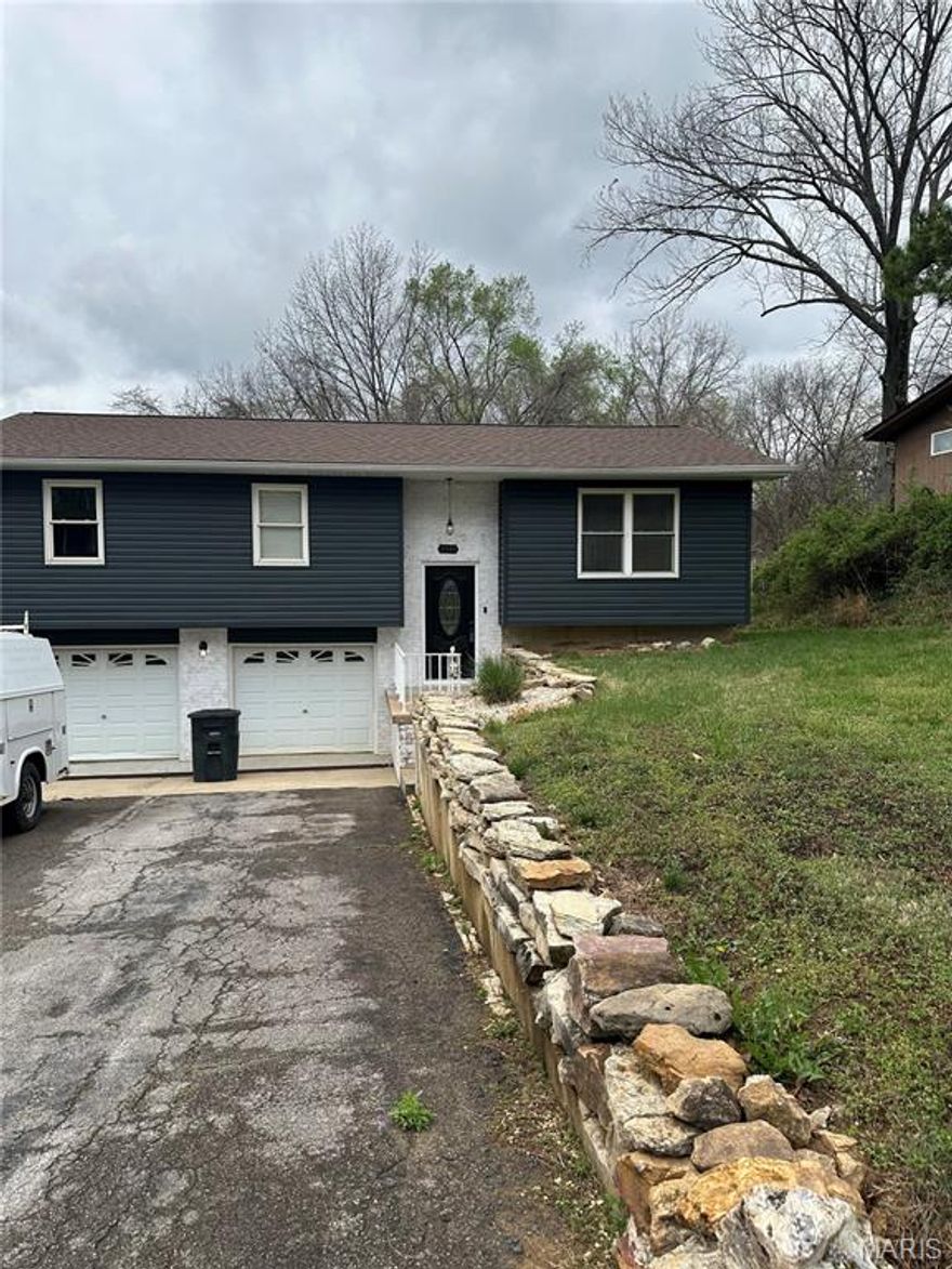 Beautifully updated home.  Loads of upgrades throughout.  This home features an open floor plan with large, center island, vaulted great room, updated flooring and lighting throughout.  Both bathrooms have been updated and gorgeous.  The exterior is nearly maintenance free with vinyl siding, newer roof and large drive way with lots of extra parking.  Convenient location near Hwy 55.