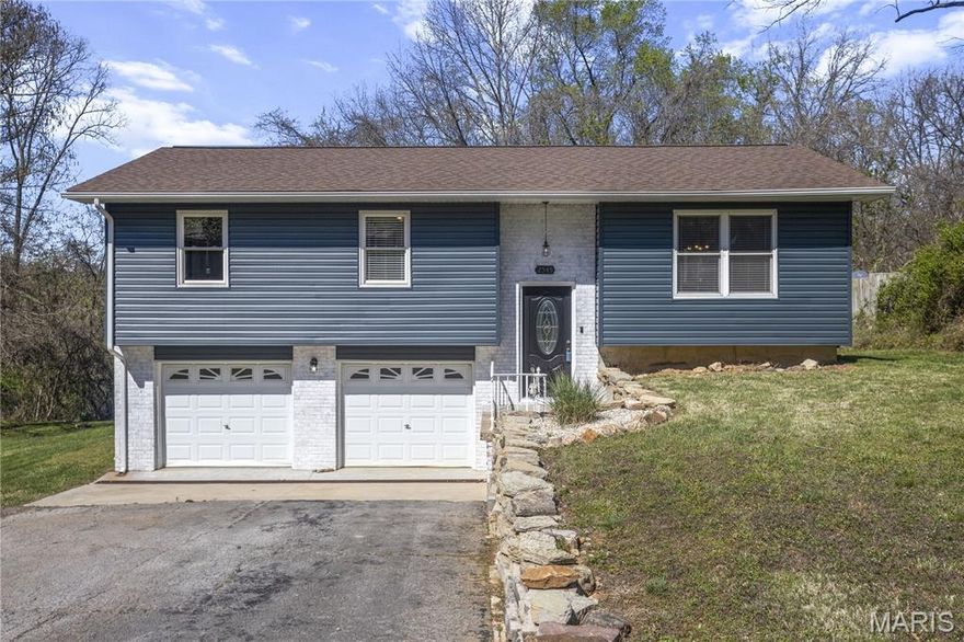 Beautifully updated home.  Loads of upgrades throughout.  This home features an open floor plan with large, center island, vaulted great room, updated flooring and lighting throughout.  Both bathrooms have been updated and gorgeous.  The exterior is nearly maintenance free with vinyl siding, newer roof and large drive way with lots of extra parking.  Convenient location near Hwy 55.