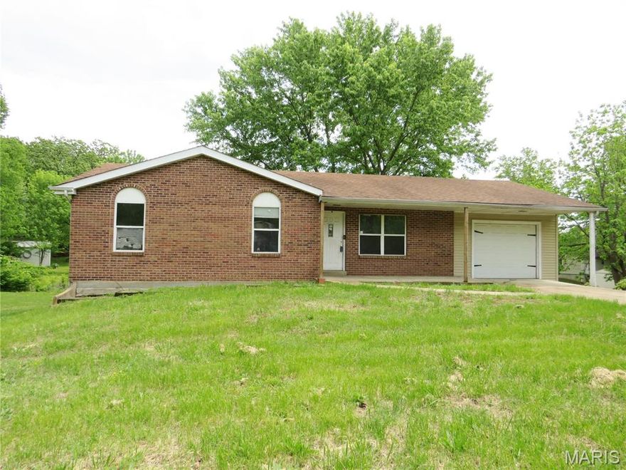 Welcome home to this charming ranch-style property offering comfort, space, and convenience all in one. Step inside to a generously sized living room and kitchen combination—perfect for everyday living and entertaining alike. The open layout creates a welcoming atmosphere with plenty of room to gather. This home features a full walkout basement, partially finished to give you flexible space for a family room, home office, or hobby area, with additional room for storage or future expansion. Enjoy outdoor living on the spacious deck overlooking the backyard, or relax with a morning coffee on the covered front porch. Ideally situated in a convenient location near I-44, this home is perfect for commuters while still being close to local schools, shopping, and everyday amenities. Whether you're starting out, downsizing, or looking for a smart investment, this property offers the perfect blend of functionality and location. Schedule your showing today and see all the potential this home has to offer!