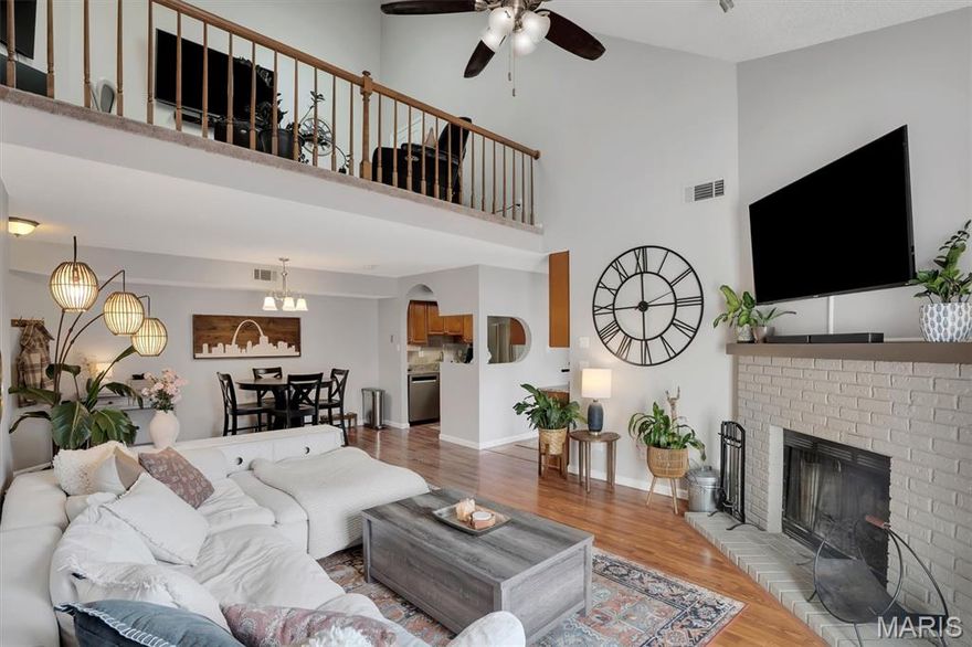 PROPERTY BACK ON MARKET AS BUYER WAS UNABLE TO SECURE FINANCING. Welcome to this spacious 2 bedroom penthouse with a bright open floor plan, high vaulted ceilings and lots of natural light in coveted St. Charles! The main level greets you with warm wood flooring throughout. The kitchen has newer custom cabinets, granite counter tops, stainless steel appliances and a separate built-in coffee bar.  The gorgeous fireplace is a centerpiece in the large great room with a ceiling fan and skylights, and then opens to a generous balcony. There is an open stairway in the great room to yet another living space/bedroom loft area with more vaulted ceilings and large closet for storage!! The primary bedroom opens up to the full length balcony and the large primary ensuite with soaring ceilings, step up separate tub and shower, and double vanity! Also convenient is the main floor laundry. Visit the beautiful grounds with 2 lakes, biking/walking trails, tennis, pickle ball, playground and pool with a beautiful clubhouse for gatherings and celebrations! There is access to the beautiful Veterans' Park through connected walking paths. Make this lovely penthouse your home today! Location: Corner Location, End Unit, Third Level
