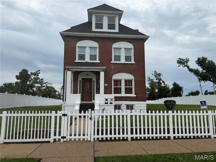 CITY LIVING. This includes the two lots, all fenced in with the house. Updated three-story, 4-bedroom, 2.5-bathroom solid brick centennial home featuring updated energy-efficient vinyl windows throughout, a newer HVAC heating and cooling system, architectural roofing, plumbing, and a hot water tank. Entry foyer. Updated kitchen and bathrooms. Convenient second-floor laundry. Bathroom on each level. Unfinished lower level that walks out to the fully fenced yard. The updated PVC plumbing is not underground. Shed stays. Seller is offering a one-year warranty at closing for the buyer’s peace of mind. MLS#25079166 & MLS#25079186 are included in the sale.