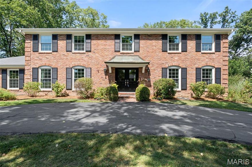 This classic two-story traditional home offers over 4000 total square feet of elegant living space, ideally situated in the heart of Des Peres. With timeless curb appeal, spacious interiors, and a finished lower level, this home is built for both everyday living and effortless entertaining. Step into the gracious foyer flanked by large formal living and dining rooms, leading to a warm and inviting family room anchored by a stately fireplace and surrounded by large windows. The inviting kitchen is the heart of the home, featuring an island and breakfast room with plenty of seating. 
Upstairs, you'll find five spacious bedrooms, including a serene primary suite with a well-appointed ensuite bath. The additional bedrooms are equally spacious, ideal for family, guests, or a home office. The finished basement offers versatile bonus space perfect for a media room, gym, playroom, or additional living area, complete with a full bath for added convenience. Outside, enjoy a private backyard ideal for gatherings, gardening, or simply relaxing. Welcome home!