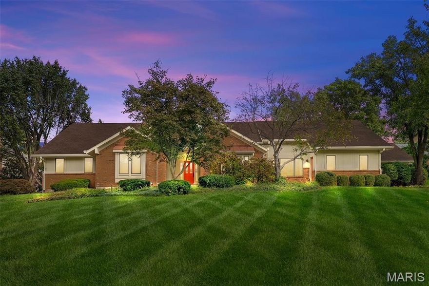 Your dream home awaits! This luxurious brick ranch in Town and Country offers over 6,500 sq. ft. of beautifully updated living and entertaining spaces, surrounded by a gorgeous outdoor setting. A rear-entry 3-car garage, meticulous landscaping, a circle drive and large covered front porch create curb appeal and welcome you inside. The two-story foyer opens to a colorful and inviting open floor plan, with soaring vaulted ceilings, gleaming tile floors, built-in shelving and storage, plus a wet bar. French doors fill the space with natural light and allow for a seamless transition to the amazing pool area in the backyard. You'll love gathering with friends and family in the dining room or the gourmet kitchen with commercial-grade appliances, stylish and integrated lighting, tons of cabinet space, granite counters, and a breakfast room with a planning desk. The renovated primary suite is a retreat with coffered ceilings, dual walk-in closets w/organizers, private patio, and a showstopper bathroom w/tile-surround shower and a freestanding tub. Three more spacious bedrooms, another renovated full bath, huge laundry room w/utility sink, and two half baths complete the main level. The finished lower level doubles your living space, adding a theater room with multiple TV connections so you don’t miss a moment of the action, plus a bar and a full kitchen. The amazing workout facility is equipped with a commercial grade Treadmill, Elliptical Machine and a Universal Gym. There’s also a sleeping area with an en-suite bath: jet tub, step-in shower, dual vanities. You'll have an office area as well as a rec room and plenty of built-in storage.  Enjoy relaxing by the heated pool even in the fall, and grill with friends on the expansive patio, with beautiful trees to act as a backdrop and add privacy. Located in a wonderful neighborhood community, with quick access to schools, highways, golf, shopping, and restaurants, this home has everything on your list and more!