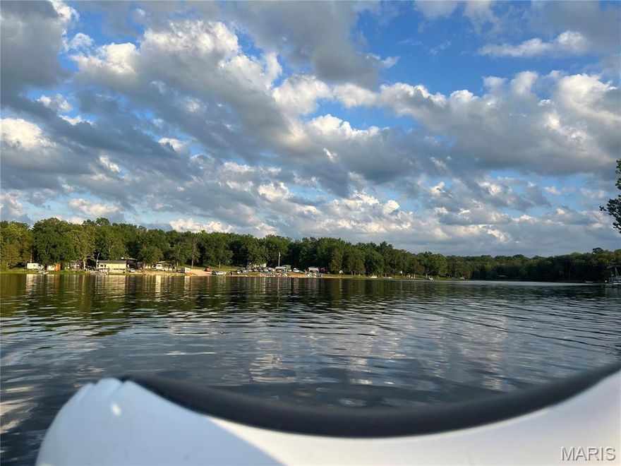 Welcome to Cedar Lake!  A 50 acre lake in a private community that offers family outdoor adventure in private setting an hour south of St. Louis.  Enjoy peace and privacy on this 0.070-acre lake-access lot tucked away in a quiet cul-de-sac. The front portion of the lot is partly cleared, making it easy to pull in a small camper or set up a primitive campsite, while the remaining area features a few mature trees, providing natural shade and a relaxing, wooded feel.
A small, quiet creek gently divides the property, adding charm and a peaceful atmosphere—perfect for nature lovers looking to unwind. 110 electric is close by, offering convenient access for future use.
Whether you’re looking for a weekend getaway, a simple camping spot, or a low-maintenance retreat near the lake, this lot offers a great balance of accessibility and seclusion.  Property is agent owner.