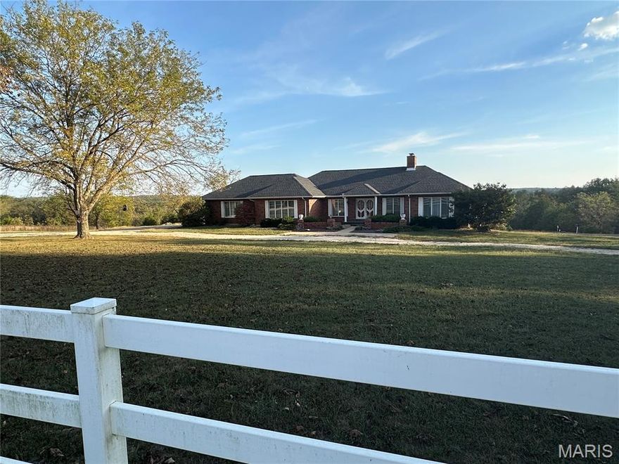 EMBRACE YOURSELF WITH THIS RARE FIND…Just 30 minutes from Rolla. 140 acres with 1+  mile of Bourbeuse River frontage. The property has a blend of natural beauty and outdoor recreation, ideal for hunting enthusiasts, nature lovers, or anyone seeking a peaceful retreat relaxing by the river or the ponds. The 5- plus bedroom 5-bath home boasts soaring vaulted ceilings and sprawling living areas, along with an expansive deck and patio ideal for grilling, entertaining, or simply taking in the breathtaking views and abundant wildlife. The property includes an 84’ x 36’ pole barn with a 15’ x 48’ attachment, plus a 36’ x 50’ barn with a 15’ x 50’ attachment, providing ample space for  machinery and equipment, livestock, or hobbies. For added convenience, a 1,440 sq. ft. guest quarters features 3 bedrooms and 1 bath, perfect for extended family, visitors, or caretakers. With fencing already in place and acres of mature timber to explore, this property is well-suited as a working farm, private retreat, or a peaceful getaway to escape it all and relax.