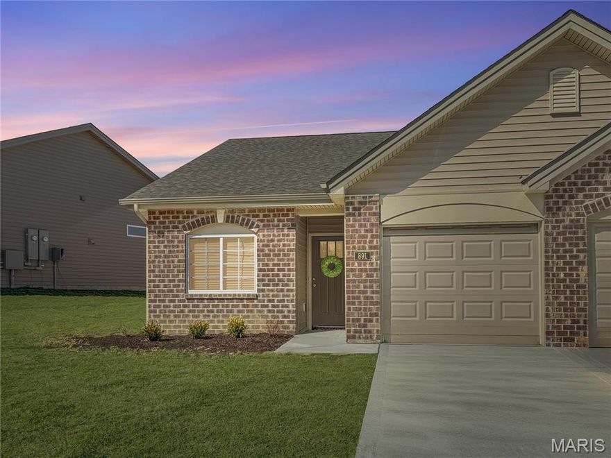 Come see this gorgeous, move-in-ready villa in a fantastic location! Designed for easy living, the zero-entry layout offers true step-free access—simply walk right in and feel at home.
Inside, you’ll love the 9-foot ceilings, stylish light fixtures, and can lighting that create a bright, open feel. The living room features two daylight windows, bringing in additional natural light. The kitchen is both beautiful and functional with quartz countertops, under-cabinet lighting, stainless steel stove and dishwasher, pull-out shelving, can lighting, and a lighted pantry—perfect for everyday cooking and entertaining.
The entry foyer opens to the spacious open-concept living area. A second bedroom is conveniently located off the entry, ideal for guests or a home office. The hallway leads to the zero-entry one-car garage and includes a closet for a stackable washer and dryer, along with a full guest bath (raised vanity and tall toilet).The primary suite offers a large walk-in closet and a private ensuite bath featuring a generous raised vanity, raised toilet, and a large glass-door shower. One car garage with 9 ft door and a key pad entry. Whether you’re looking for full-time living or a seasonal retreat, this villa is a perfect fit. Exterior maintenance is handled by the association for just $160 per month, giving you more time to relax and enjoy your home and community Washington Mo. Seller  coving $6600 closing costs credit at closing. buyer receives the remaining builder's warranty.