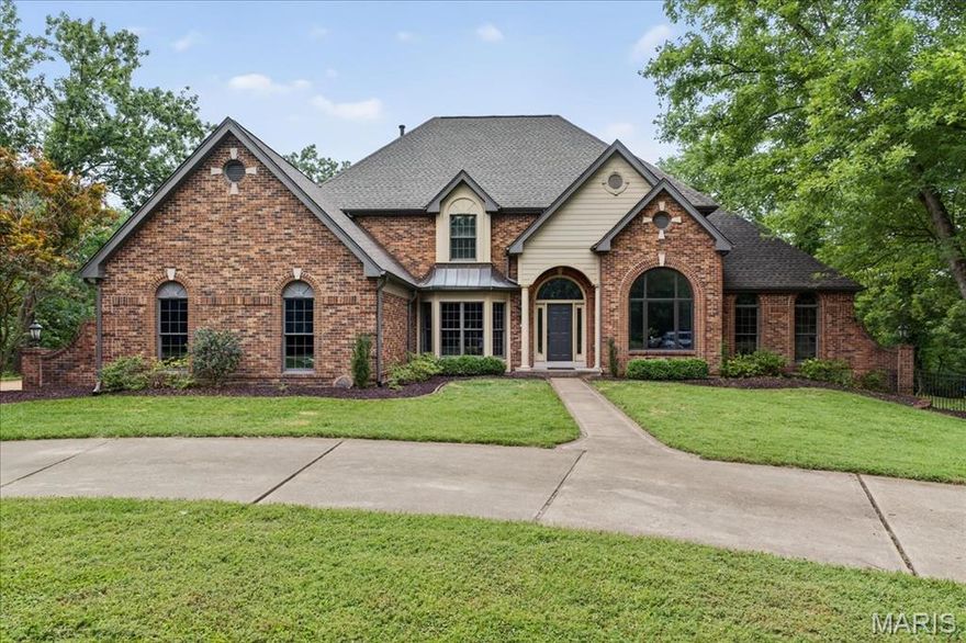 Contingent and continuing to show for back-up interest. Nestled on three acres in the heart of Oakville, this luxurious custom-built home offers an elegant blend of modern convenience and tranquility. The two-story foyer offers a stunning staircase and decorative marble flooring, anchored by a light-filled office and formal dining room, both featuring detailed millwork and 9-foot ceilings. The great-room is surrounded by expansive floor-to-ceiling windows designed to bring the outside in. The exceptional chef's kitchen boasts a 16-foot island, 6-burner Thermador gas range/oven, Bosch oven/microwave, granite countertops, subway-tile backsplash, farmhouse sink and 36" custom cabinetry. Off the kitchen is a breakfast room with gas fireplace and access to the composite deck overlooking the outdoor oasis. The main floor primary ensuite provides accessibility and ease with separate sinks and dual closets. The upper level has a spacious open landing, three bedrooms and two full baths. The freshly painted walk-out lower level offers 9-foot ceilings, over 1500 sq. ft of addt'l living space with gas fireplace, full bedroom/bath, workout room, office, 2nd full bathroom and full kitchen. Revel in the view of the 44,000 gallon saltwater pool from the gazebo with pass-through fireplace and expanded deck with built-in grill. This sanctuary promises a lifestyle of privacy and connection, where every day feels like a getaway.