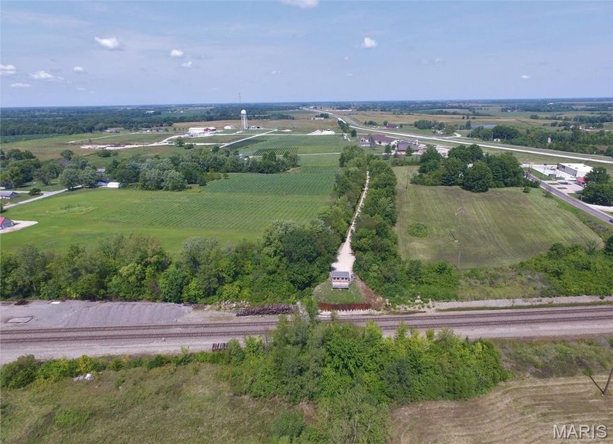 Prime Commercial Development - 40+/- ; Acres in La Plata, MO
Exceptional commercial opportunity on US Route 63 with dedicated highway exit. Located 10 minutes from Kirksville, 20 minutes from Macon. Dual access via North Brown Street and Amoco Road.

Unmatched Transportation Connectivity:
Adjacent to La Plata Amtrak Station with daily service to Kansas City/Chicago. Airport 6 minutes away with multiple daily flights to Chicago.

Development-Ready Infrastructure:
All utilities in place - electric, water, sewer, natural gas, internet, cable, trash service.

Ideal For:
Wholesale clubs, outlet centers, shopping centers, warehouses, distribution centers, truck stops, medical centers, entertainment complexes, restaurants, retirement communities.

Key Advantages:
Highway frontage with dedicated exit
Rail and air connectivity
Complete utility infrastructure
Multiple development possibilities
Strategic Midwest location

Rare combination of size, location, and connectivity creates unmatched opportunity for commercial development. Transportation nexus position with shovel-ready utilities eliminates development barriers.