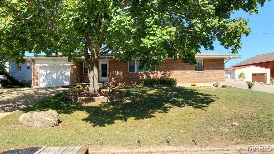 Spacious 3 bedroom, 2 bath with large living room, dinning room and step saver kitchen including refrigerator, electric cook top, wall oven, dishwasher and microwave. New paint throughout and shows like a model home. Most closets are fresh and lined with cedar. Bedrooms are split with one on each end of this home one having a fireplace but needing a closet or could just be a den or computer room. Entry through the Sun Room into the rear fenced yard welcomes you to a small garden area with storage shed for tools. Great location close to down town with shopping and amenities. A large beautiful tree stands tall to protect and shad the front yard with perennial flowers and plants.