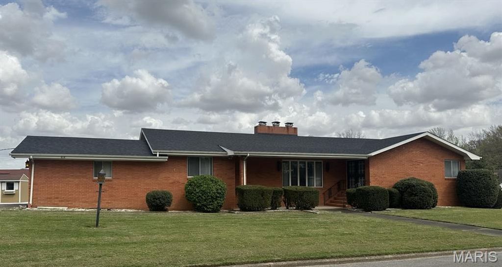 Photo of 707 Trotter Lane, Dexter, MO 63841 (MLS # 26020167)