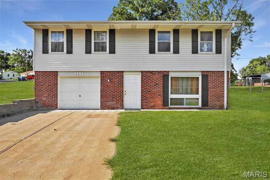 Welcome to this beautifully refreshed 3 bedroom home located in the highly sought after Parkway School District. Recent updates include brand new vinyl flooring and fresh paint throughout, giving the home a clean and modern feel from top to bottom.

Step inside to a welcoming main level that offers a versatile layout with a bright living room, dedicated office space, a full bathroom, and a bonus room that adds flexibility for a playroom, workout space, or additional lounge area. This level also provides direct access to the garage, ideal for a small car or motorcycle, and features built in cabinetry for extra storage.

Upstairs, you will find an open and airy floor plan where the kitchen flows seamlessly into the family room, creating a great space for everyday living and entertaining. Large windows and the rear door bring in abundant natural light and open to an expansive backyard, perfect for outdoor gatherings or quiet evenings at home. All three bedrooms are conveniently located on this level.

Ideally situated just minutes from major shopping, dining, and everyday conveniences including Costco and Walmart, this move in ready home offers comfort, functionality, and location all in one. A must see!