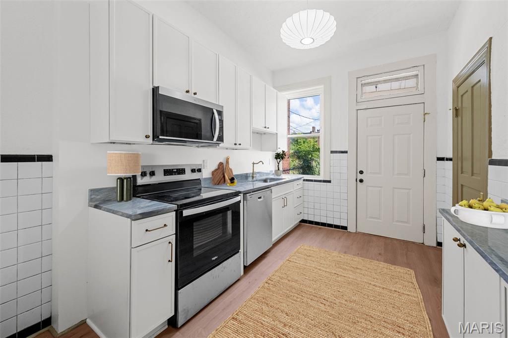 Photo of 4541 Wichita Avenue, St Louis, MO 63110 (MLS # 25072988)