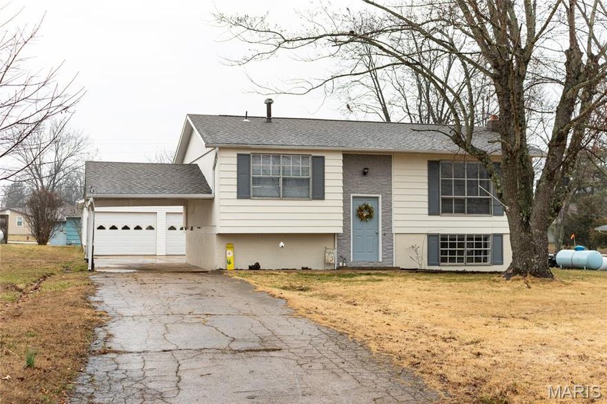 Charming and newly remodeled 3-bedroom, 2-bath split-level home full of character and nestled in the scenic Mark Twain National Forest area. This inviting property offers the perfect blend of comfort and outdoor adventure, located close to numerous state parks, trails, and recreational opportunities.

Inside, you'll find a spacious layout featuring two separate living areas, providing plenty of room for relaxing or entertaining. The bedrooms feature beautiful hardwood flooring, while the main living room offers cozy carpeted comfort. The lower level includes a large family room, second full bathroom, and additional storage space, making it ideal for gatherings, guests, or a hobby area.

Outside, enjoy the level backyard, perfect for outdoor activities, gardening, or simply enjoying the peaceful surroundings. The property also includes a carport and a detached two-car garage, offering ample parking and workspace.

Whether you're looking for a full-time residence or a peaceful retreat near nature, this home offers comfort, charm, and access to some of Missouri’s best outdoor recreation.