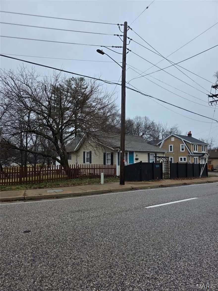 So many opportunities in this too cute of a house! First time buyer? Rental? Air BNB?  Great curb appeal on a huge lot. Main floor bedroom and cute master bath. Combo dining room and family room. Updated kitchen with a wall of windows overlooking a private fenced yard! Lower level features a second bedroom,family room,laundry and a full bathroom. Lets not forget about the private deck. Some updates include  updated basement bathroom,newer toilets,master shelving,newer roof,tuck pointing,gutters,fence, fresh paint on trim,and fence,deck stain, fire pit area,newer water heater,new HVAC, newer lighting throughout, fresh gravel in  driveway,smart thermostat,sump pump. What a cute house!!