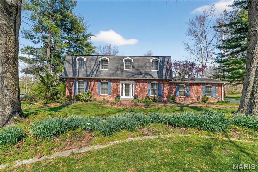 Spacious and versatile 1.5-story home in sought-after Sunset Hills, perfectly designed for a growing family! Situated on a level 1-acre lot, this property offers the ideal blend of comfort, function, and outdoor enjoyment. The main floor features a thoughtfully designed layout with a bright kitchen, formal dining room, private office, living room, laundry room and a cozy family room with a gas-burning fireplace—perfect for everyday living and entertaining. A standout feature is the main-floor primary suite, ideal for an in-law arrangement or private guest quarters. Upstairs, you’ll find a second expansive primary suite complete with a large bathroom that includes a double vanity, shower, soaking tub and walk-in closet. There are 2 additional bedrooms and loft area that can serve as a playroom, study space, or additional lounge. Step outside to your own backyard retreat featuring a 20 x 40 inground pool with diving board and 10-ft depth, surrounded by cool decking for comfort on hot summer days. The outdoor space is made for entertaining with a hot tub, firepit, and plenty of room to relax or play. A heated and cooled pool house located behind the 2-car garage adds even more flexible space for hobbies, guests, or entertaining. Located in the highly desirable Lindbergh School District, this home offers space, flexibility, and amenities that truly make it stand out.