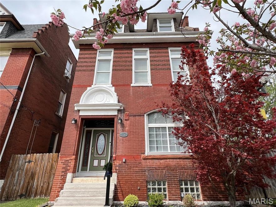 Welcome to 2241 Shenandoah Ave. in McKinley Heights! This spacious 3-story historic home offers 4+ bedrooms, hardwood floors, and the perfect mix of character and modern updates. Fresh paint, new carpet, and a beautifully renovated 2nd-floor bath make it move-in ready. The light-filled main level features high ceilings, large windows, open living spaces, and a flexible bedroom/office space. The dining room flows into the kitchen and includes a large closet and wine storage—ideal for entertaining.

Upstairs offers 3+ bedrooms and a large laundry room. The primary suite includes a huge walk-in closet, while a second bedroom features a private deck plus adjoining nursery or living area. The updated bath includes a jacuzzi tub and separate walk-in shower. The 3rd floor adds a versatile 4th bedroom with walk-in closet and ensuite full bath—perfect for blended families and guests.
Enjoy a low-maintenance fenced yard, 2-car garage port, and side yard for pets or gardening—great for BBQs and Summer parties! Enjoy nearby Taylor Park and the market and food trucks at Tower Gove Park. Close to great restaurants like Little Fox, Lona’s Lil Eats and Crafted. Walk or ride your bike to Lafayette Park, Soulard, and other cityt neighborhoods. Come and see this spacious gem and make your dream a reality.