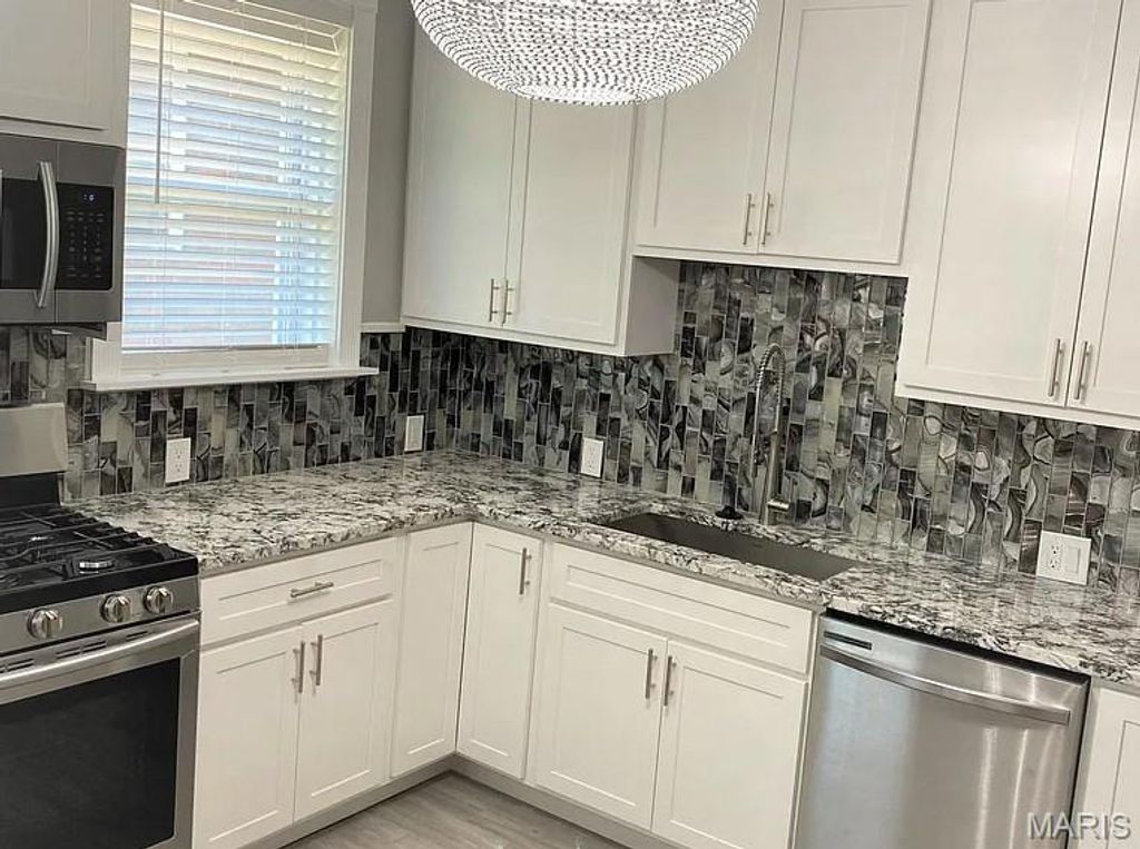 Photo of 7130 Amherst Avenue #B, St Louis, MO 63130 (MLS # 25073072)