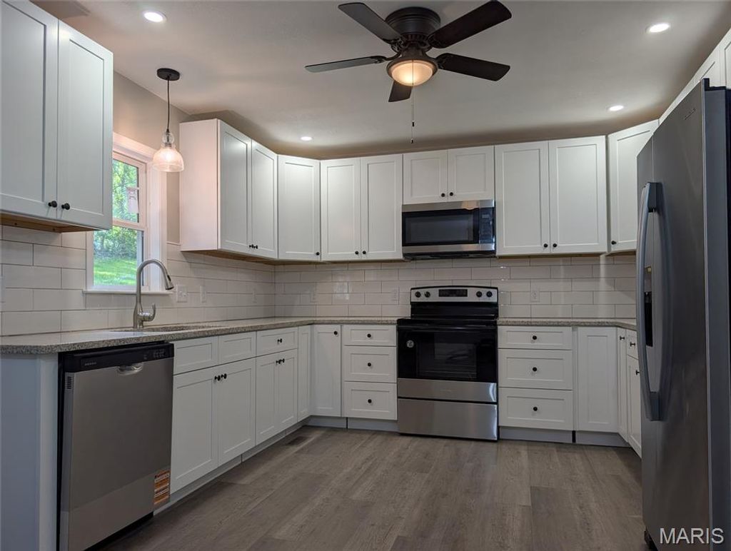 Photo of 601 Boyne Street, De Soto, MO 63020 (MLS # 26028874)