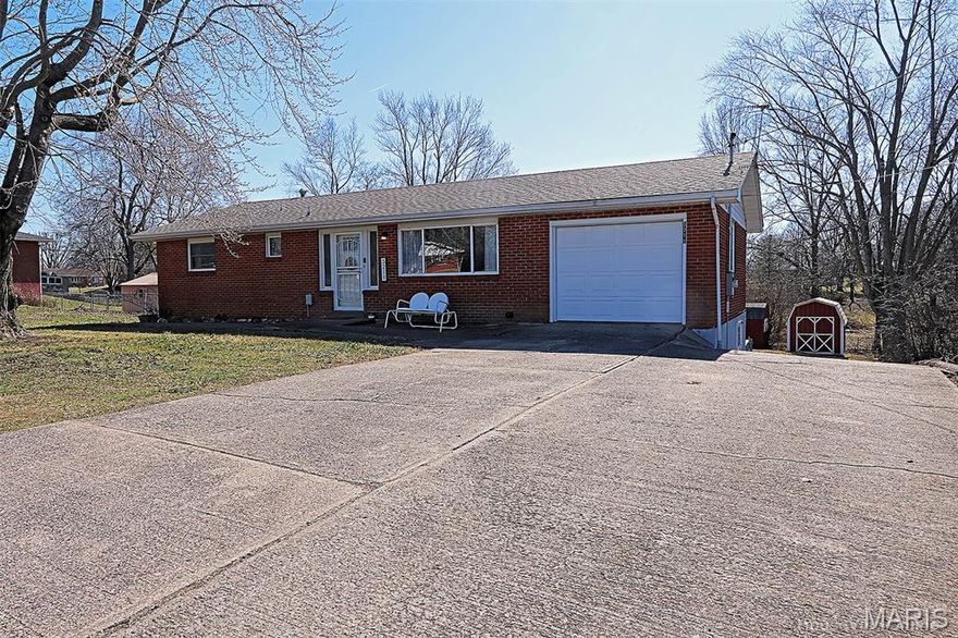 Spacious All-Brick 2BR/2BA Home 
Just West of Jackson 
Discover comfortable living in this 
well-maintained all-brick home, ideally located approximately 2-3 miles west of Jackson, MO. Situated on a generous half-acre lot, this property offers privacy, outdoor space, and room 
to grow. 
Features You'll Love 
• 2 Bedrooms | 2 Full Bathrooms 
• New flooring throughout clean, modern, and move-in ready 
• Updated interior with quality upgrades 
• Walk-out basement with abundant natural 
light 
• Two kitchens - perfect for versatility 
• Extra space to finish a third bedroom in the 
basement 
• Ideal mother-in-law quarters or rental potential 
• Driveway access to the backyard for easy parking/storage 
• Fenced backyard - secure and great for pets or gatherings 
Whether you're looking for comfortable main floor living, extended living space downstairs, or a place with income potential, this property delivers on space and functionality. Approx. 600 ft in basement.