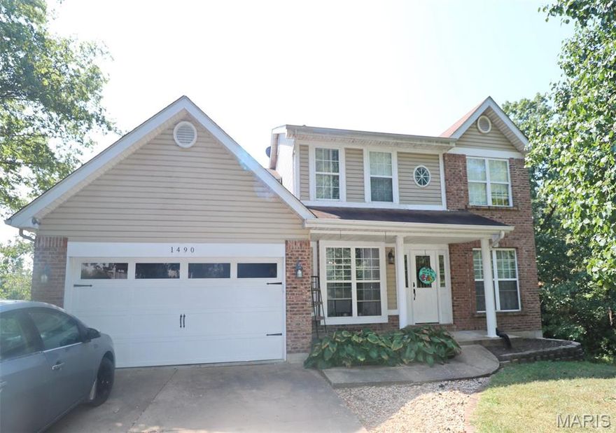 Discover a haven of comfort and style at 1490 Cole Rd in Festus, MO. This spacious 4-bedroom, 4-bathroom home spans nearly 3,000 square feet and offers a harmonious blend of modern upgrades and classic charm. Imagine preparing your favorite meals in a beautifully updated kitchen with sleek granite countertops, then enjoying cozy evenings by the fireplace in the inviting living area. The primary suite is your personal retreat, featuring a walk-in closet for all your essentials.

Step outside to a fenced yard where a sparkling pool awaits, perfect for summer gatherings or quiet relaxation. Hardwood floors throughout add warmth and elegance, while the garage provides ample storage and convenience. This home is not just a place to live, but a lifestyle to embrace. Experience the perfect mix of community and privacy in a sought-after location.

Opportunities like this are rare. Contact us to explore this exceptional home and schedule your private tour today!