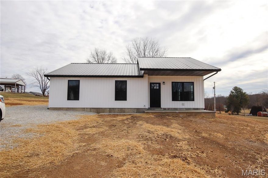 Welcome to this 1248 sq ft new construction home featuring open-concept living  Designed for convenience, everything is located on the main floor with easy access throughout. Step inside from the covered front porch into the spacious living room, perfect for entertaining family and guests. The open layout flows seamlessly into the kitchen, which offers an island, dining area, brand-new stainless steel appliances, and luxury vinyl plank flooring throughout. Continue your entertaining outdoors with easy access from the dining room to the back patio. The primary bedroom includes a walk-in closet and a full bathroom. Additional features include a convenient main-floor laundry room.