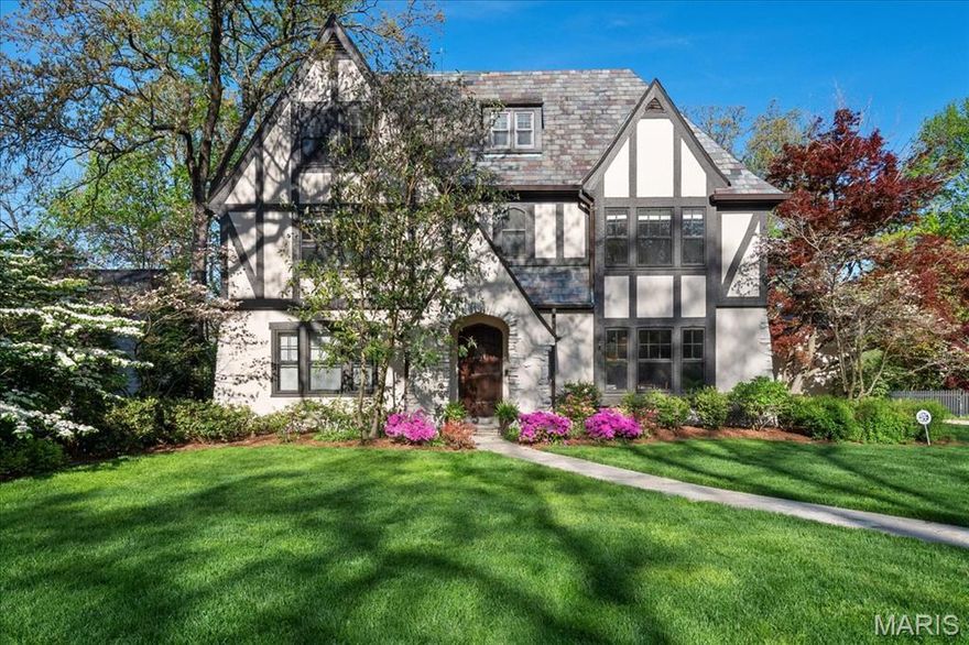This stunning 4+ bedroom, 4.5-bath Tudor home in the heart of Sherwood Forest offers an inspired blend of old-world craftsmanship and modern sophistication. Thoughtfully updated while preserving its architectural integrity, the home features refinished hardwoods, arched doorways, luxurious finishes, and generous room sizes throughout. The main level includes formal living and dining rooms, an expansive kitchen, a butler’s pantry, and a breathtaking great room with cathedral ceilings and walls of windows. Upstairs, you’ll find a spa-like primary suite, an ensuite bedroom, two additional bedrooms with a hall bath, and a second laundry hook-up. Vaulted ceilings enhance the finished third floor—with a full bath and generous storage—offering endless versatility. Outside, the landscaped backyard, flagstone patio, and screened porch provide a private retreat. With a rare attached two-car garage and mudroom, this meticulously maintained home in a prime Webster Groves location is truly special! Additional Rooms: Mud Room