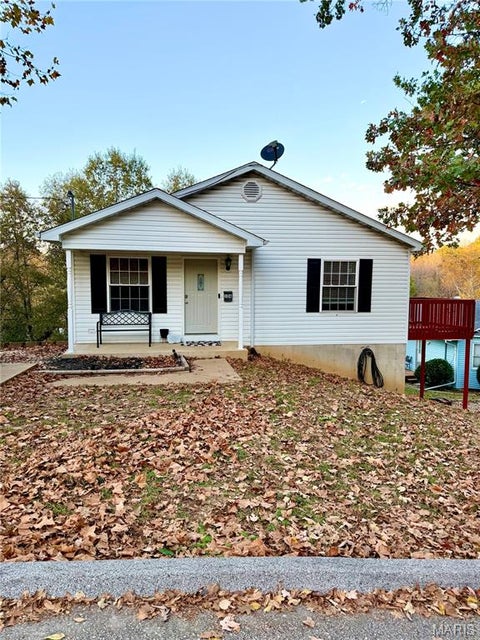 Photo of 506 E Stone Street, De Soto, MO 63020 (MLS # 26069517)