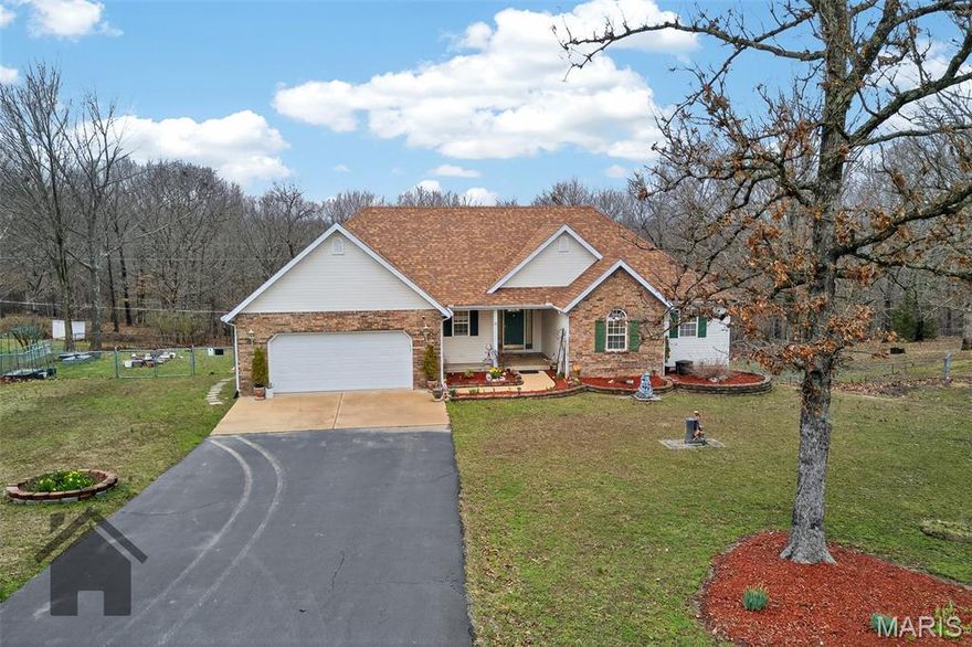 Discover this nicely landscaped Ranch-style house located just minutes from the front gate of Fort Leonard Woodl This house offers four bedrooms (including a non-conforming basement bedroom) and three bathrooms. The lovely kitchen features granite countertops, three sinks (one with reverse osmosis), tile flooring and backsplash, recessed lighting, cherry-finish cabinetry, and a closet pantry. Stainless steel appliances include a French-door refrigerator, and the kitchen also offers two garbage disposals and a breakfast bar with seating for two to three.

The dining room includes a bay window, chandelier, and access to the covered deck. The carpeted living room has a vaulted ceiling and lots of natural lighting. The home received a new roof in 2022 and has leaf-guard gutter covers. Additional features include a whole-home water filtration system and a premium water softener.

Outside, the chainlink fenced backyard offers a covered deck and a back patio and a covered concrete front porch. The tiled entry foyer includes a closet. A security system is installed, and the basement provides a large storage area. An extra basement refrigerator and washer and dryer may also be included.