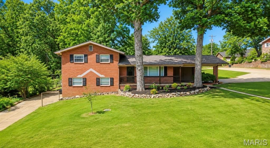 Photo of 1945 Woodhaven Road, Poplar Bluff, MO 63901 (MLS # 26036748)