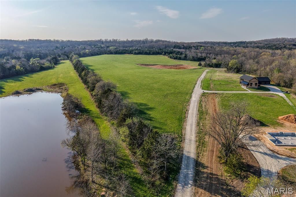 Photo of 0 Honeysuckle Lane, Lebanon, MO 65536 (MLS # 26021474)