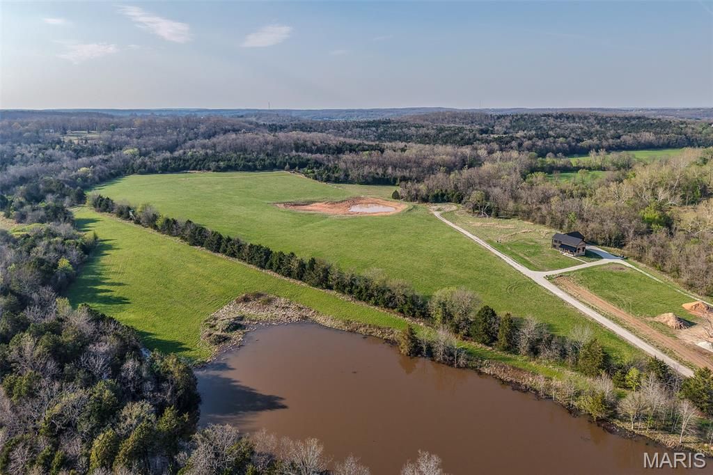 Photo of 0 Honeysuckle Lane, Lebanon, MO 65536 (MLS # 26021474)