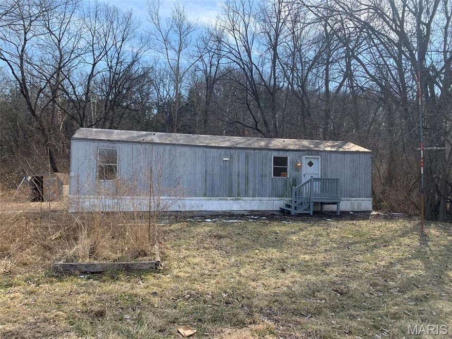 Welcome home to comfort and possibility.
This move-in-ready two-bedroom home sits on approximately 0.4+/- acres and is ready to be the setting for your next chapter. Step inside to find new flooring throughout, creating a fresh, clean feel from the moment you enter.

Outside, you’ll find a yard framed by mature trees, complete with a back deck and large shed—perfect for relaxing, entertaining, or simply enjoying the space around you.

Whether you’re starting out, downsizing, or looking for a place that feels like home from day one, this property offers comfort, space, and charm—inside and out.