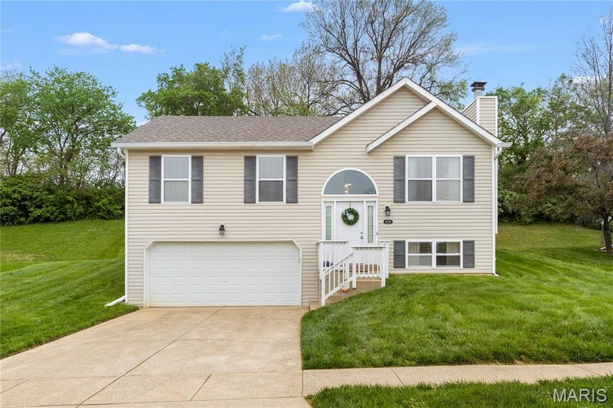 First time on market - Elegant split foyer with 3 bedrooms, 2 baths and FINISHED LOWER LEVEL on QUARTER ACRE lot - situated on quiet dead-end street backing woods. Classic CURB APPEAL with low-maintenance vinyl siding, OVERSIZED 2-car garage and grand ARCHED WINDOW over 2-story entry foyer. Step up to spacious living room with incredible eastern-facing NATURAL LIGHT and cozy woodburning FIREPLACE - ideal for gatherings. Open kitchen/dining with white cabinets, QUARTZ COUNTERS, storage pantry and gas cooking (refrigerator stays). Relaxing PRIMARY SUITE with step-in shower. Secondary bedrooms share hall bath with tub/shower combo. Downstairs multi-purpose room with carpet, convenient laundry (washer and dryer stay), plus storage. Updated HVAC systems. Fantastic location with errands within 2 miles. Short drive to 48-acre Evangelista Park, and 260-acre North County Rec Complex (pool, gym, track, playground) with Eagle Springs Golf Course (2 courses, driving range, shop, restaurant).