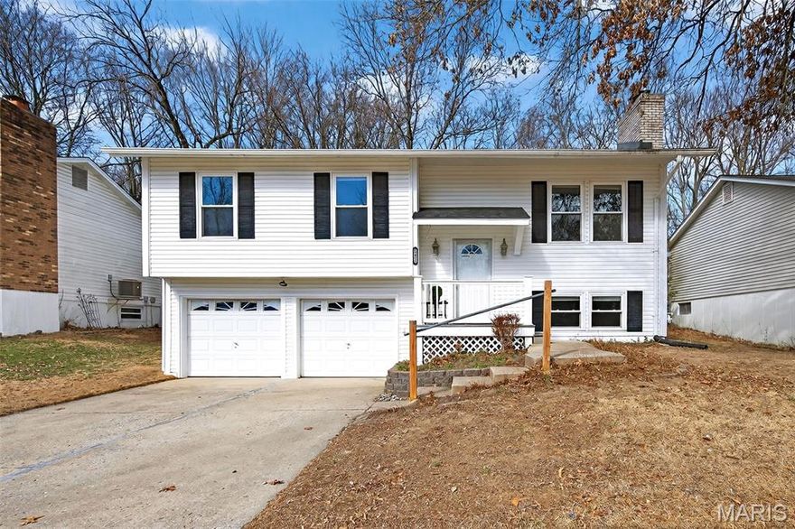 Location is everything, and this home delivers! Situated at the end of a quiet cul-de-sac and backing to woods, this darling 3-bedroom home offers both convenience and a peaceful setting. The fenced backyard features a spacious deck overlooking mature trees, where deer and local wildlife are frequent visitors. Explore the common ground to find a trail leading to Creve Coeur Park and enjoy the feeling of being surrounded by nature while still being close to everyday amenities. The open floor plan is filled with natural light and warm neutral colors. The kitchen offers white cabinetry, pantry & breakfast bar that opens to the dining area. The primary bath has been updated with double vanities, a private water closet, and a custom tile shower. The finished lower level features a warm, cozy family room with gas fireplace & newer LVP flooring. You'll also find a 1/2 bath, laundry area, plus bonus room great for a home office. 
Additional features include an oversized 520 sq ft garage with storage area, insulated garage doors, vinyl-sided front exterior and composite front porch. This home offers the rare combination of thoughtful updates, functional living space, and a natural setting that feels removed from the everyday — all while remaining close to parks, shopping, dining, Maryland Heights Community Center and a short walk to the subdivision pool!  A truly special opportunity in an established and desirable location.
