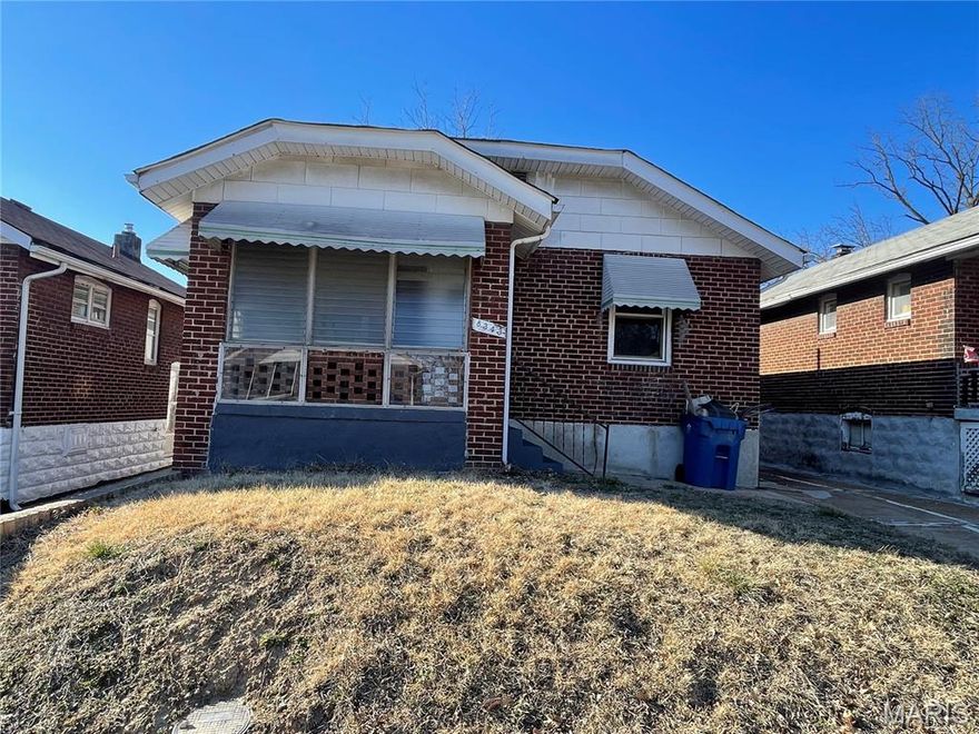 Investors, this one's for you! This brick bungalow offers 1050 sf of living space with 2 bedrooms, 1 bathroom, living room, true dining room, kitchen, bath, full basement, and off-street parking. Inspections are welcome for your knowledge, but the sale is as-is with seller to do no repairs. The roof is brand new, with warranty!  Rentometer indicates average rent would be $1028; this home was most recently rented for $1100. Using that figure, gross annual income would be 13,200.  Have a look, make your offer...then put your special touch on it and let the cash flow begin.