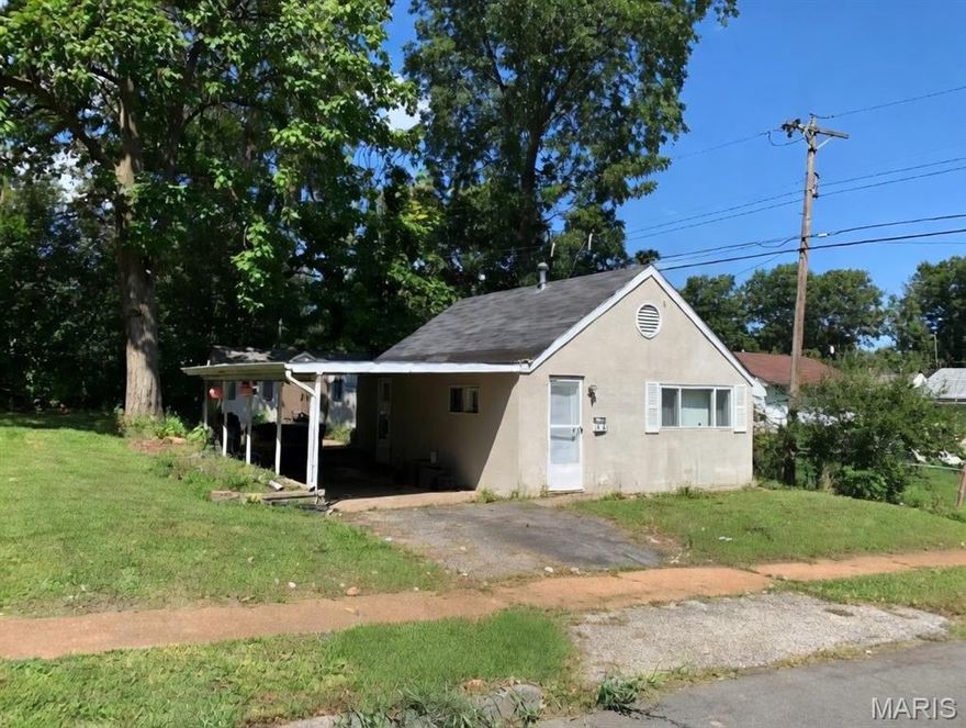 Fantastic first-time homebuyer opportunity in the heart of Overland! This tidy 1-bedroom, 1-bathroom cottage sits on an impressive, oversized level lot—perfect for gardening, pets, or future expansion. The low-maintenance stucco exterior and durable chain-link fencing offer peace of mind. Inside, you’ll find an efficient 4-room layout that maximizes every square inch. Why rent when you can own this cozy retreat? Located in the Ritenour School District with quick access to local parks and highways. Sold in current as-is condition. Schedule your showing today!