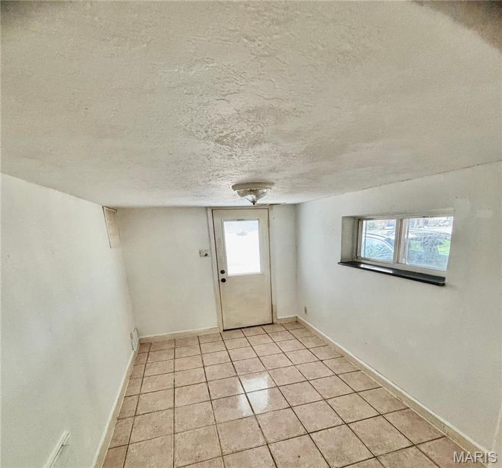 Photo of 1947 Spencer Avenue, Overland, MO 63114 (MLS # 26013466)