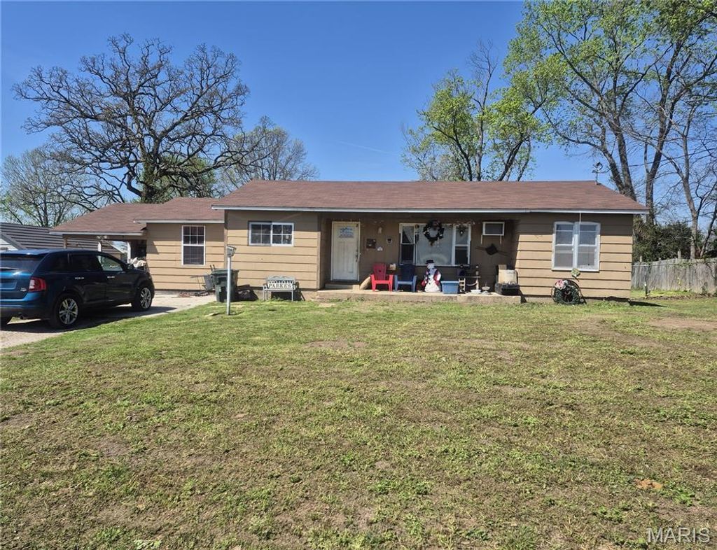 Photo of 501 N Walnut Street, Fair Play, MO 65649 (MLS # 26021556)
