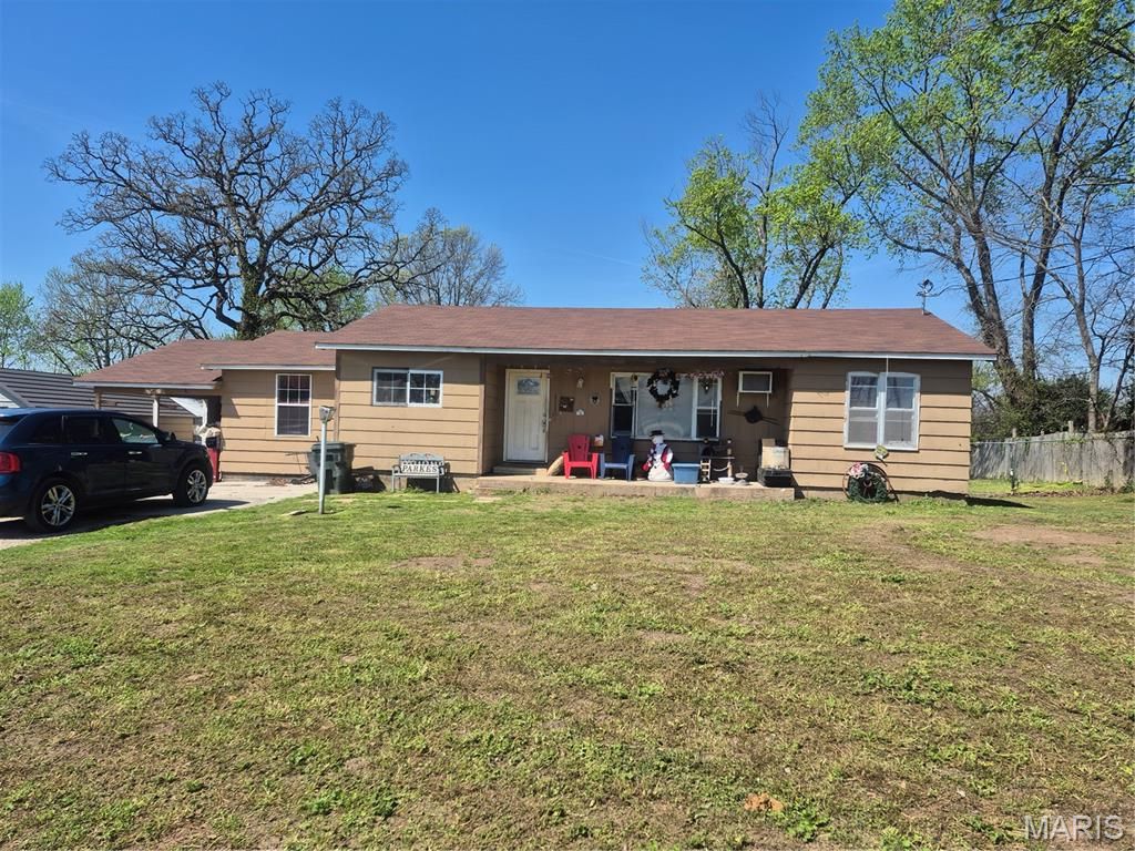 Photo of 501 N Walnut Street, Fair Play, MO 65649 (MLS # 26021556)